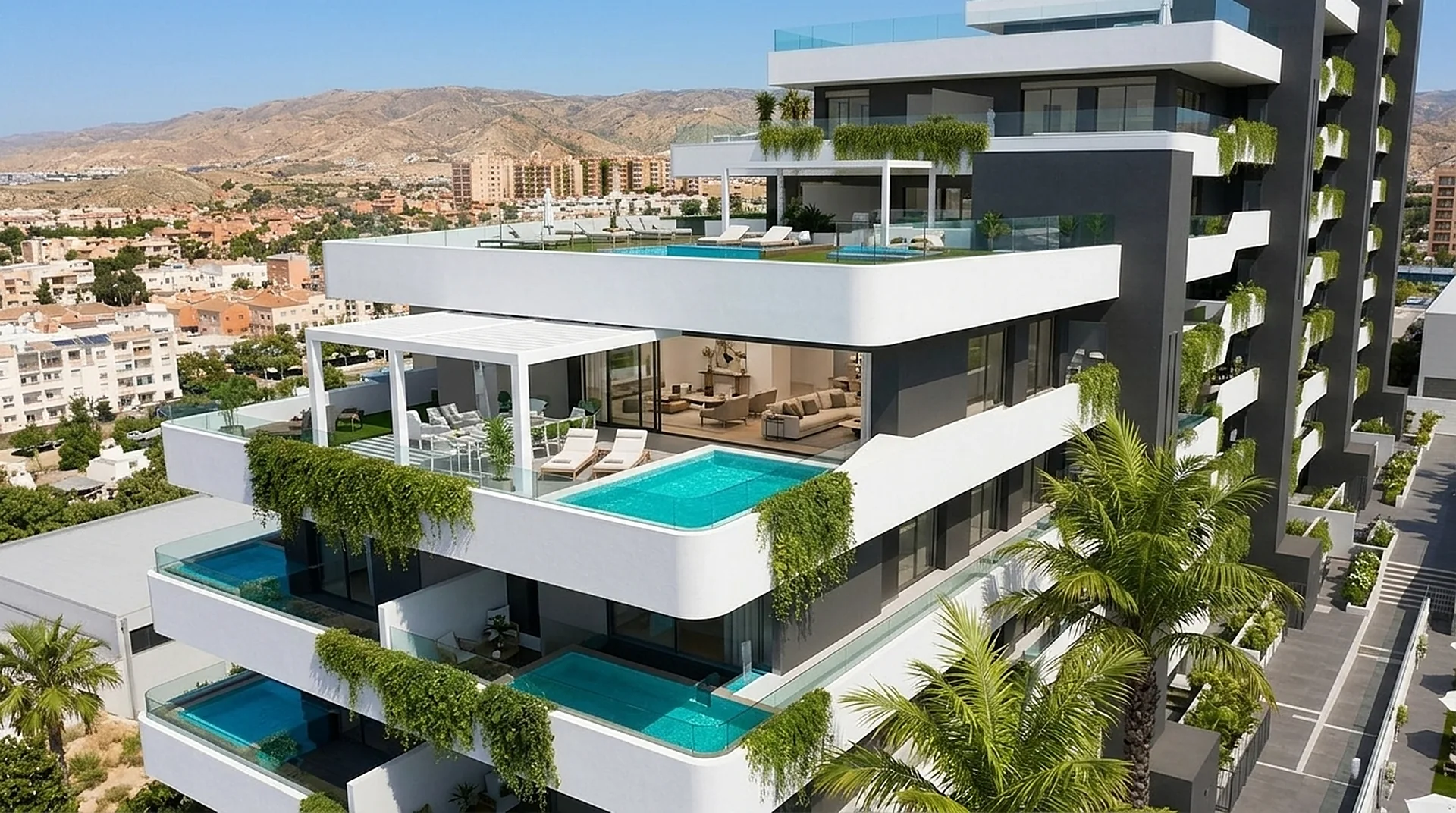 Terrazas de la cuarta planta con pérgola, tumbonas y piscina privada.